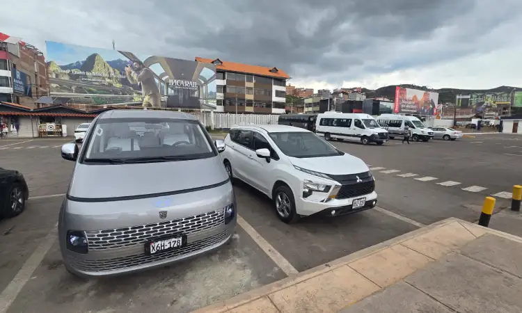 private transfer cusco airport driver waiting passenger